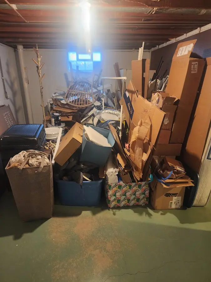 Roll-off dumpster container at job site for Concrete Dumpster Rental in Monmouth